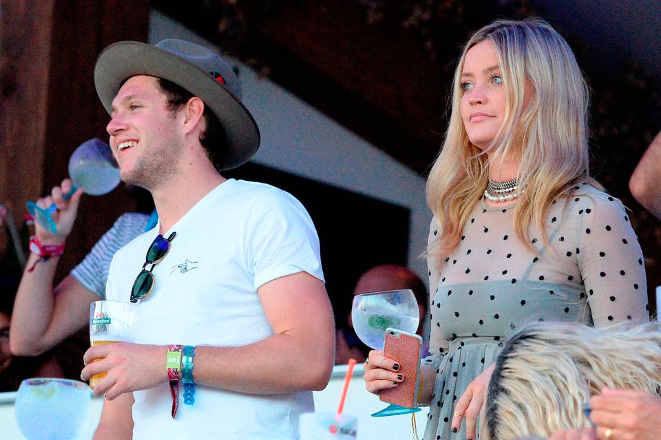 Niall Horan and Laura Whitmore enjoy the atmosphere as they listen to  Tom Petty perform as they attend the Barclaycard Exclusive British Summer Time Festival at Hyde Park on July 9, 2017 in London, England.  (Photo by Eamonn M. McCormack/Getty Images for Barclaycard)