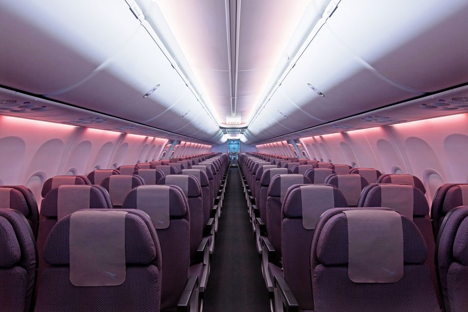 The airline cabin of a Qantas 737-800