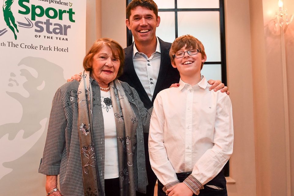 22 December 2014; Padraig Harrington, with his mother Breda and son Paddy, during the Croke Park Hotel / Irish Independent Sportstar of the Year Luncheon 2014. The Westbury Hotel, Dublin. Picture credit: David Maher / SPORTSFILE