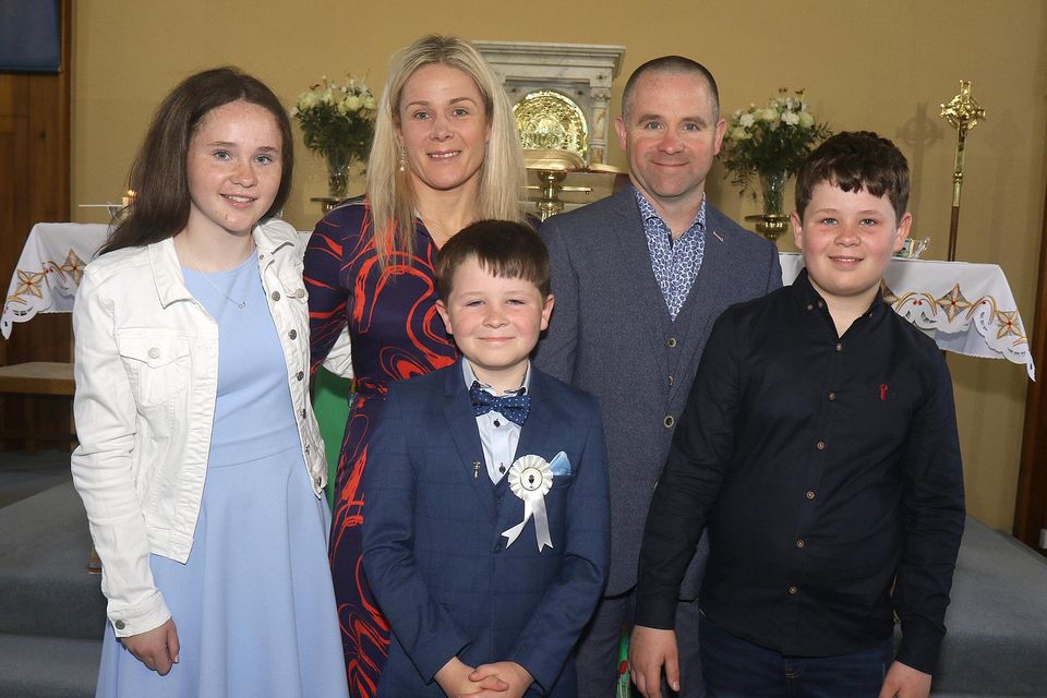 Darragh Doyle, Castledockrell NS pictured with his parents Liz and Colum, sister Chloe and brother Jack at his First Holy Communion.
