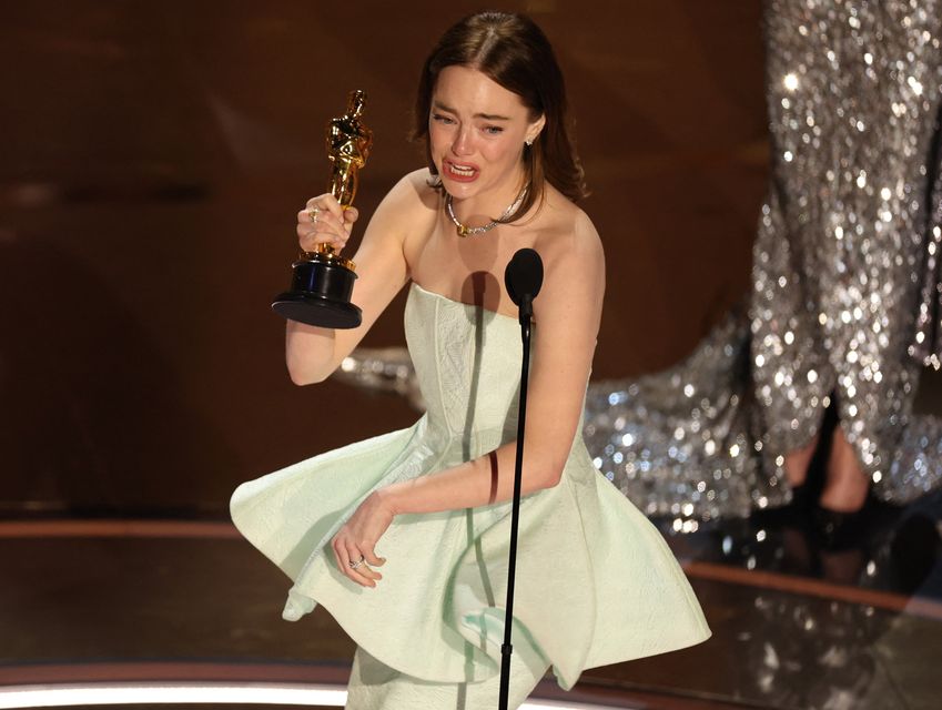 Emma Stone accepts the Oscar for Best Actress for "Poor Things" during the Oscars show at the 96th Academy Awards in Hollywood, Los Angeles, California, U.S., March 10, 2024. REUTERS/Mike Blake