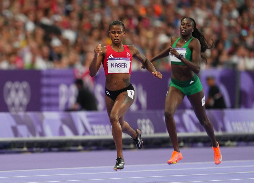 Rhasidat Adeleke of Ireland and Salwa Eid Naser of Bahrain in action during the Olympics 400m semi final in Paris 