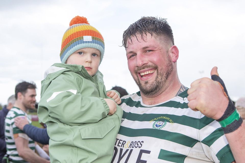 Jack and Ben Diaper celebrate as Greystones make the step up to AIL Division 2A following their win over Galway Corinthians at Dr. Hickey Park.
