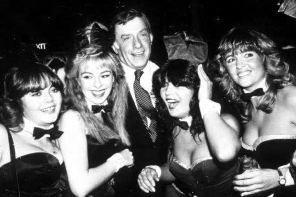 Victor Lownes with bunnies at a party at Stringfellow's in 1982 Credit: Rex Features