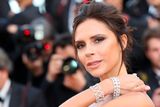 thumbnail: British fashion designer Victoria Beckham poses as she arrives on May 11, 2016 for the opening ceremony of the 69th Cannes Film Festival