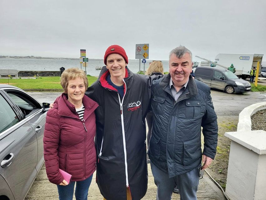 Michael Fassbender with Dermot and Ann Marks when he was in Greenore for shooting a scene for the film 'Kneecap'. Picture: @carlingfordire Facebook