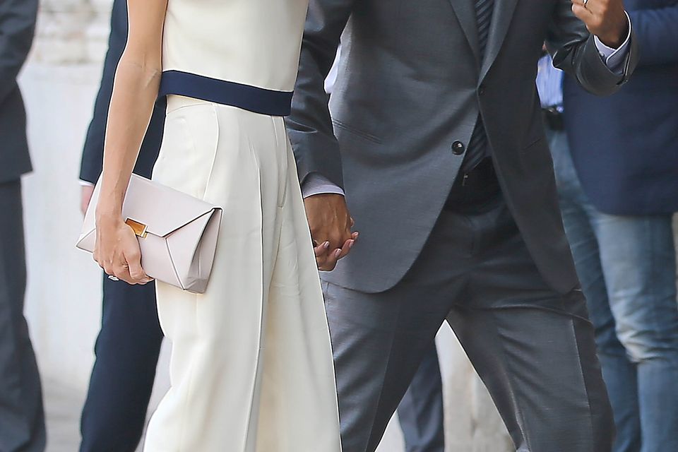 George Clooney and Amal Allamudin leave on September 29, 2014 at the palazzo ca farsetti in Venice