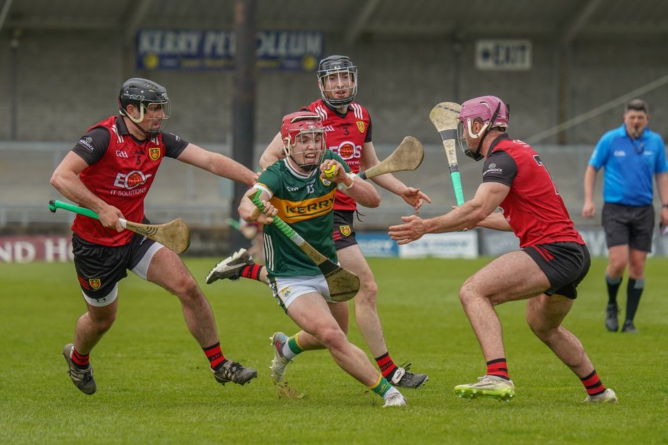 Kerry’s Luke Crowley (13) is surrounded by Down players during their Joe McDonagh Cup Round 2 game at Austin Stack Park. Photo: Mark O’Sullivan