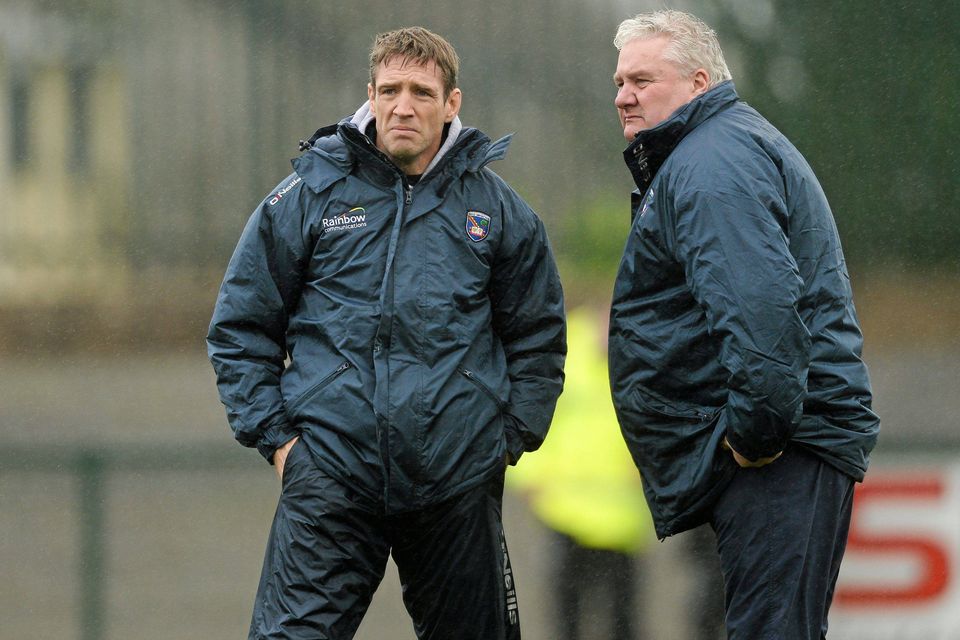 Armagh assistant manager Kieran McGeeney (left) and Armagh manager Paul Grimley in December 2013. Photo: Sportsfile