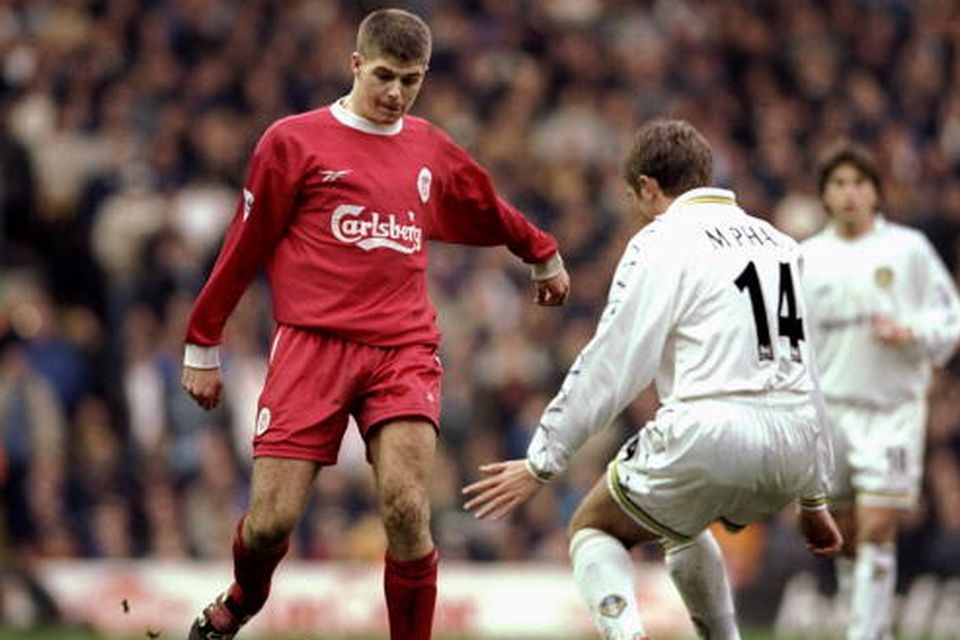 Steven Gerrard is challenged by Stephen McPhail at Anfield in 2000