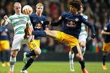 thumbnail: Celtic's Leigh Griffiths and FC Salzburg's Andre Ramalho  battle for the ball during the UEFA Europa League match at Celtic Park, Glasgow. PRESS ASSOCIATION Photo. Picture date: Thursday November 27, 2014. See PA story SOCCER Celtic. Photo credit should read Danny Lawson/PA Wire.
