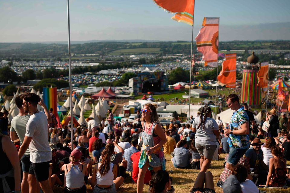 Revellers attend the Glastonbury Festival of Music and Performing Arts on Worthy Farm near the village of Pilton in Somerset, South West England, on June 26, 2019. (Photo by Oli SCARFF / AFP)OLI SCARFF/AFP/Getty Images