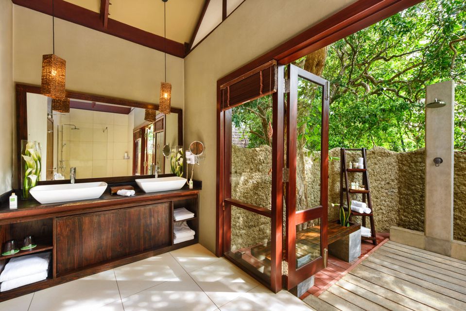 Inside out: Jungle Beach cabins feature tropical outdoor showers