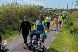 thumbnail: A group in Ballinskelligs who took part in the 7th annual Cool Siúl in Ballinskelligs. The event is in memory of Katherine Fitzpatrick of Ballinskelligs who passed away in January 2017, and it's organised as a fundraiser for Ballinskelligs Community Care and Scoil Mhicíl by her family. Photo by Christy Riordan