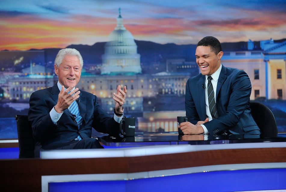 Bill Clinton(L) and Trevor Noah on the set of The Daily Show in New York City. Photo by Brad Barket/Getty Images for Comedy Central.