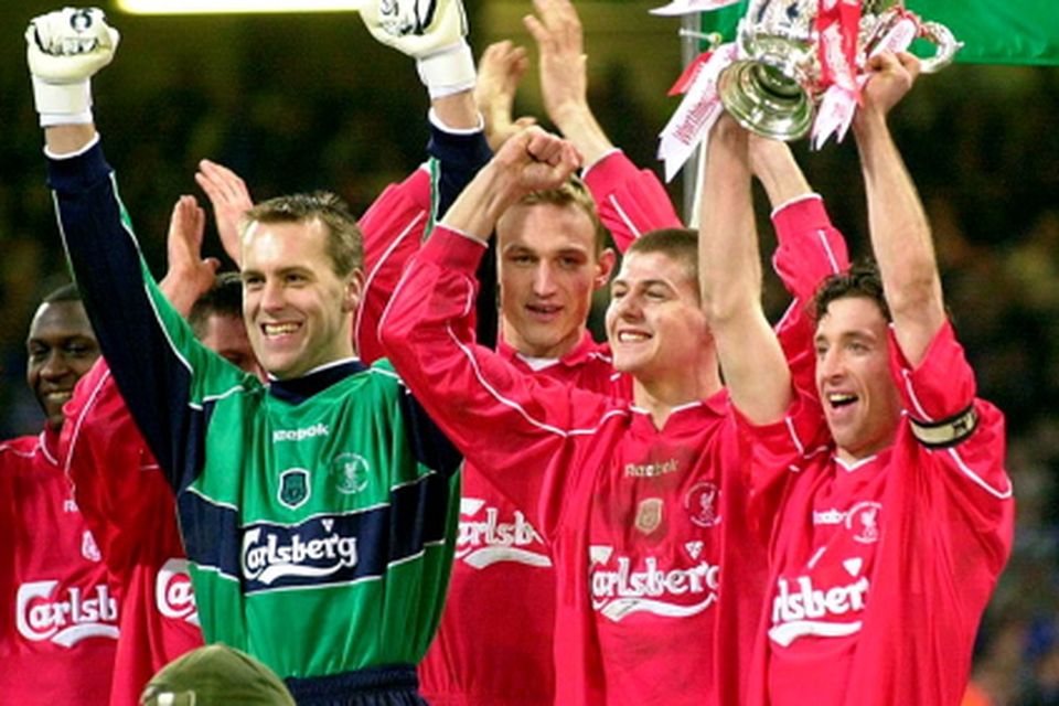 File photo dated 25-02-2001 of Liverpool captain Robbie Fowler (far right) and Steven Gerrard holds up the Worthington Cup after his side beat Birmingham City following a penalty shoot-out in the Final, at the Millennium Stadium, in Cardiff. 
David Jones/PA Wire.