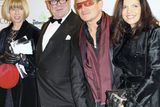 thumbnail: Paul McGuinness and wife Kathy Gilfillan pictured with Bono and his other half Ali Hewson