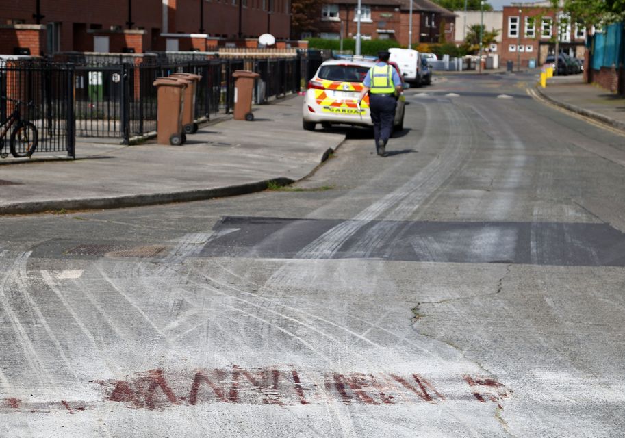 Blood is seen on the road as gardaí continue their investigations into the gangland shootout on Knocknarea Road, Drimnagh.  Photo: Collins