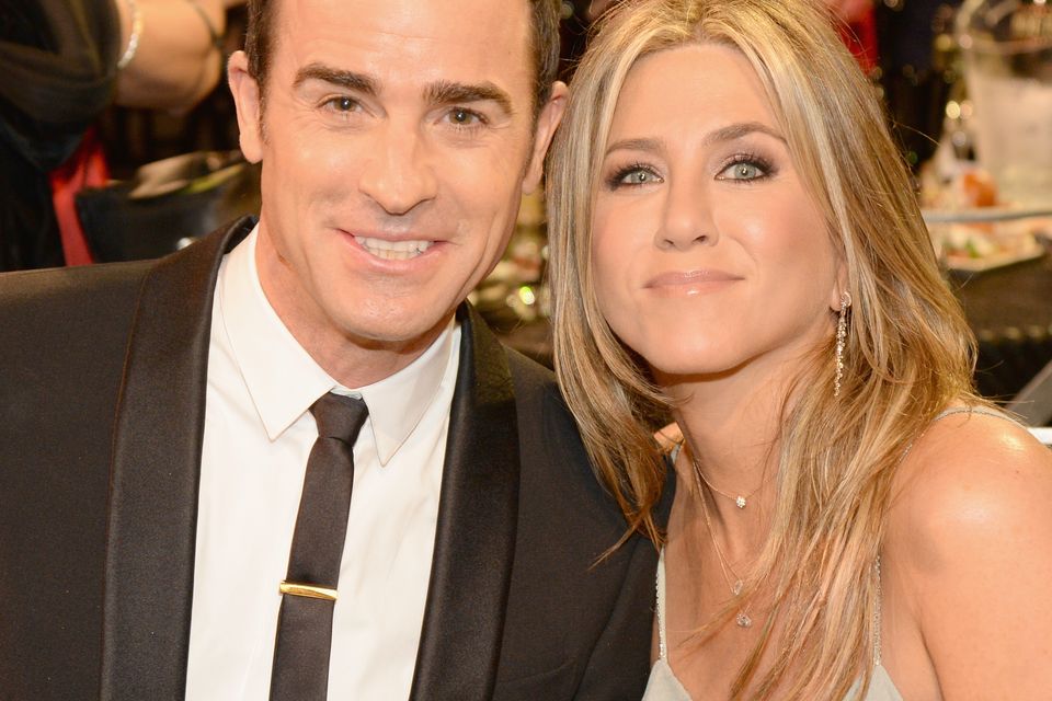 US actor Justin Theroux, left and his wife US actress Jennifer