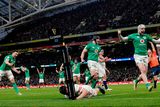 thumbnail: Ireland players, from left, Jack Conan, James Ryan, and Mack Hansen celebrate their side's third try, scored by teammate Dan Sheehan, not pictured, during the Guinness Six Nations Rugby Championship match between Ireland and England at the Aviva Stadium in Dublin.