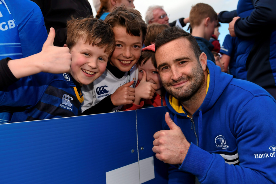 Leinster’s Dave Kearney with supporters, from left, James Doyle, Rory and Jack Byrne during Monday’s open session at the RDS Photo: Sportsfile