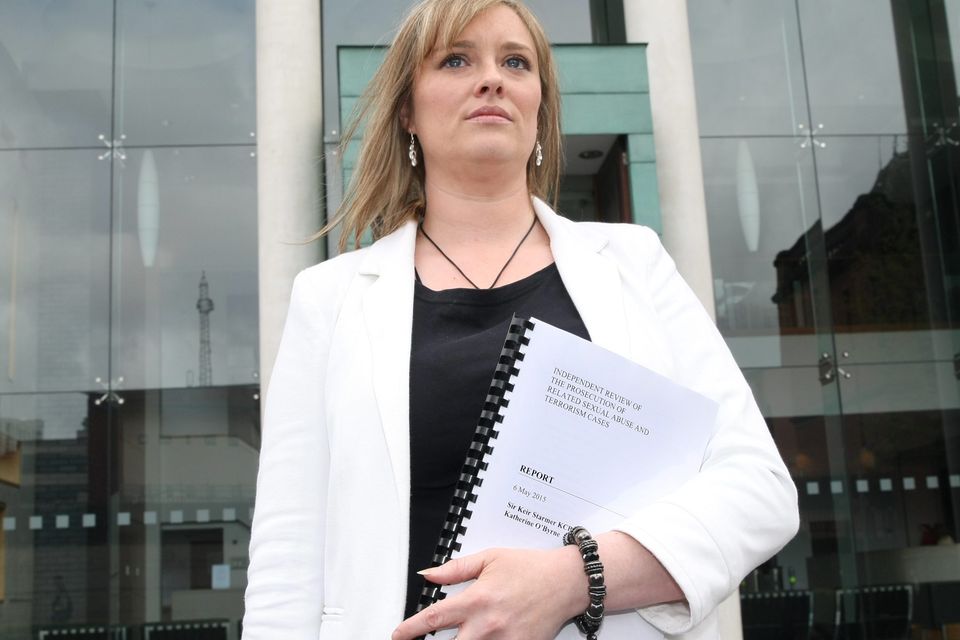 Mairia Cahill in Belfast with a copy of the report into how her sex abuse case was dealt with by the PPS.
