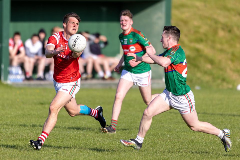 Mark O'Connor of East Kerry in action against Anthony Kelliher of Mid Kerry during the Acorn Life County U-21 Football Championship quarter-final in Fossa. Photo by Tatyana McGough