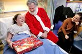thumbnail: Santa delivers presents to a delighted Abbie Spain (10)