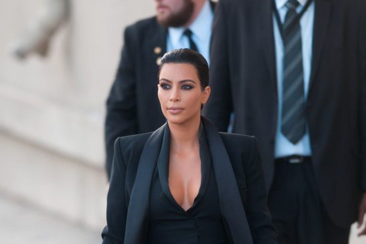 Kim Kardashian wears bodysuit with plunging neckline and sheer skirt for LA  appearance