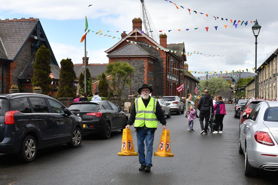 Joe McCumiskey puts out the no parking bollards at the Greenore Port and Village 150th Anniversary celebrations. Photo: Ken Finegan/www.newspics.ie