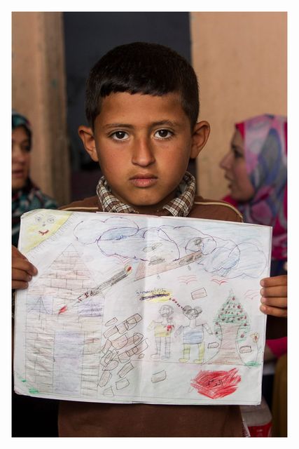 Zain Ebrahim (9) was top of his class but now draws pictures of missiles bearing down on his family