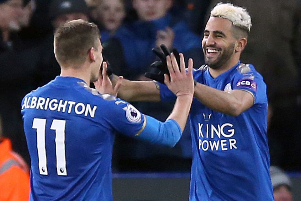 Riyad Mahrez, pictured right, opened the scoring for Leicester against Huddersfield