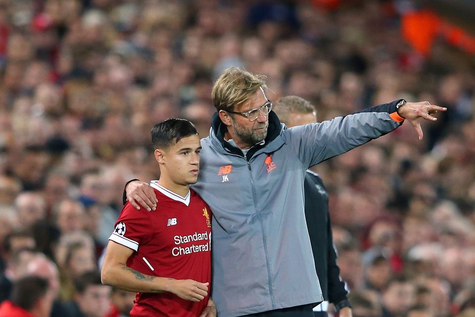 Jurgen Klopp the manager of Liverpool FC talks with Philippe Coutinho during the UEFA Champions League group E match between Liverpool FC and Sevilla FC. (Photo by Alex Livesey - UEFA/UEFA via Getty Images)