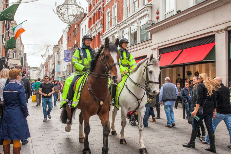 Garda Orla Keogh (left) riding Donagh, and Garda Clare Anderson, riding Cumhall, on duty on Grafton Street in Dublin City Centre