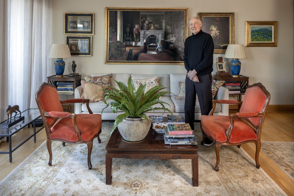 Ib Jorgensen in the sitting area of the open-plan dining/living room. Above the sofa is a family portrait of his first wife Patricia and their two daughters, painted in the family home in Fitzwilliam Square when the girls were young. The painter was Niccolo d’Ardia Caracciolo who was killed in a car accident in Italy. The orange chairs are early 19th century. Photo: Tony Gavin