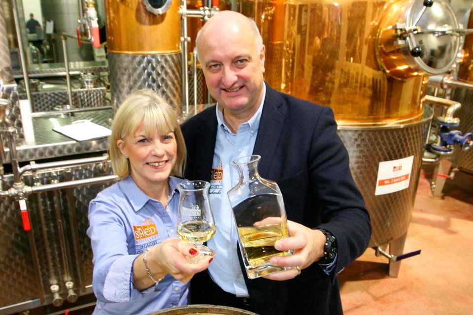 Pat Rigney and his wife Denise at The Shed Distillery which has not paused production. Photo by Brian Farrell