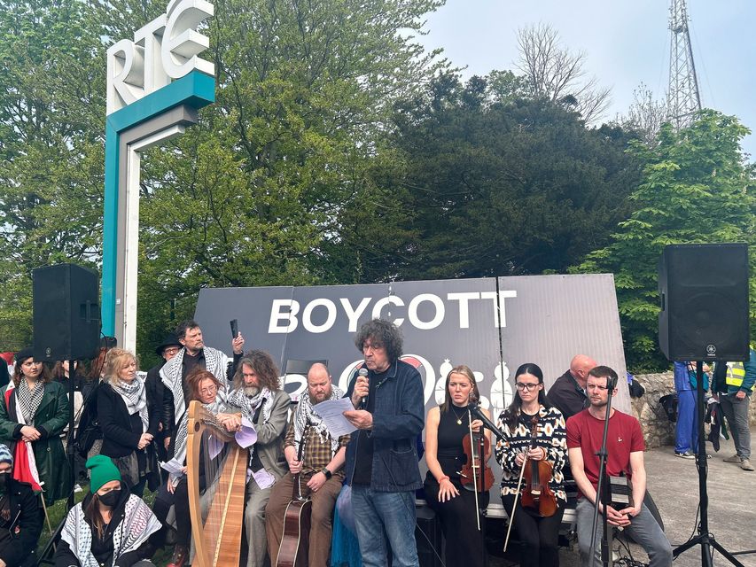 Actor Stephen Rea reads a poem as part of a protest calling for Ireland to boycott Eurovision in front of RTÉ (Cillian Sherlock/PA Wire)