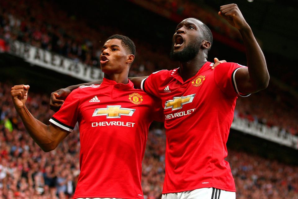 Manchester United's Romelu Lukaku, right, celebrates with Manchester United's Marcus Rashford after scoring his side's first goal