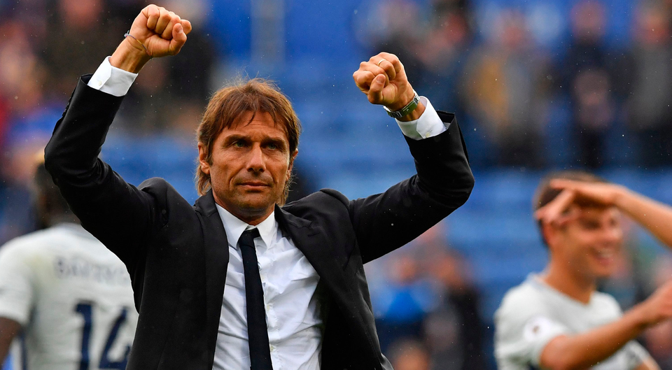Chelsea's Italian head coach Antonio Conte celebrates on the pitch after the match. Photo: Getty Images