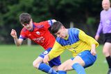 thumbnail: James Doyle of Curracloe United keeping tabs on Darragh Kent of Campile.