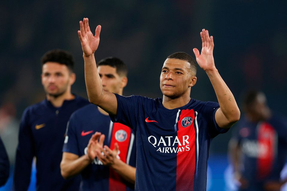 Kylian Mbappe of Paris Saint-Germain looks dejected as he acknowledges the fans after defeat to Borussia Dortmund during the UEFA Champions League semi-final second leg match between Paris Saint-Germain and Borussia Dortmund at Parc des Princes on May 07, 2024 in Paris, France. (Photo by Richard Heathcote/Getty Images)
