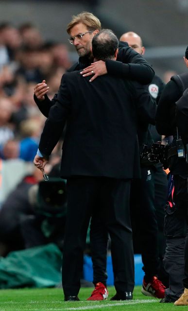 Klopp and Newcastle United manager Rafael Benitez after the match