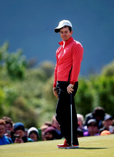 Rory McIlroy reacts to a missed putt on his final hole as he finished the day on 9 over par during day one of the Dubai Duty Free Irish Open at Royal County Down Golf Club, Newcastle. 
Brian Lawless/PA Wire