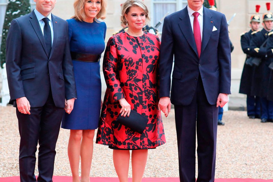 French First Lady Brigitte Macron Elevates Classic Navy Suiting