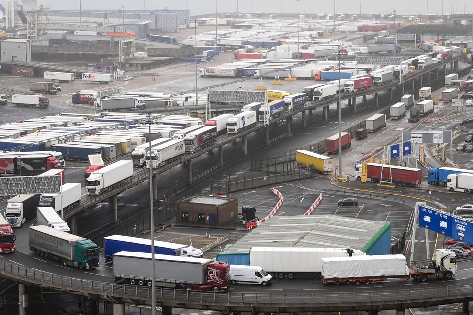 Lorries queue to embark on a ferry at the entrance of the Port of Dover, southeast England, on February 16, 2022.  (Photo by Glyn KIRK / AFP) (Photo by GLYN KIRK/AFP via Getty Images)