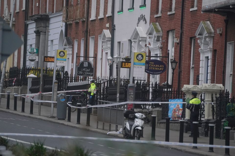 Gardai at the scene of the incident in Parnell Square. Photo: Brian Lawless/PA.