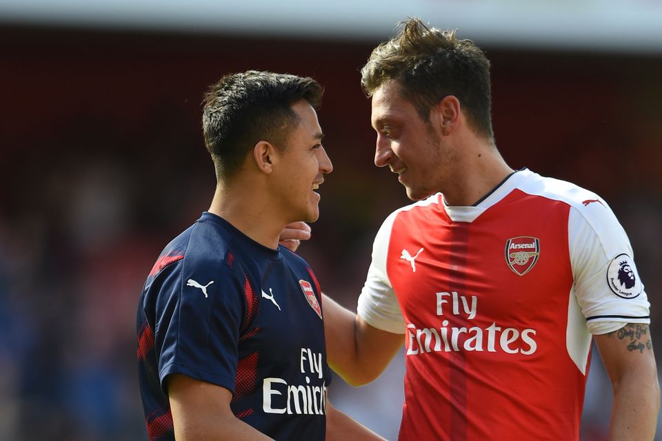 Mesut Ozil, right, and Alexis Sanchez are out of contract next year