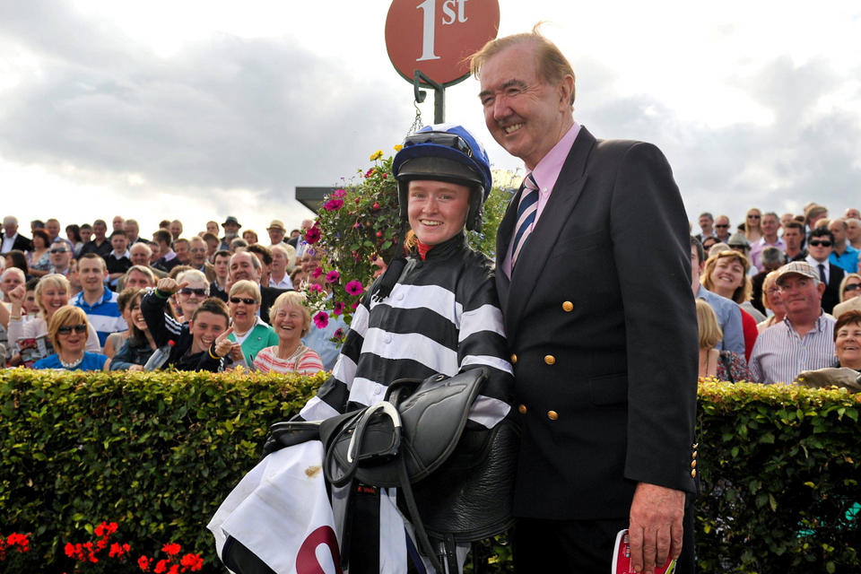 Jockey Jane Mangan in the parade ring with trainer Dermot Weld after winning the Carlton
Hotel Galway City Handicap on Midnight Magic in 2012 at Ballybrit