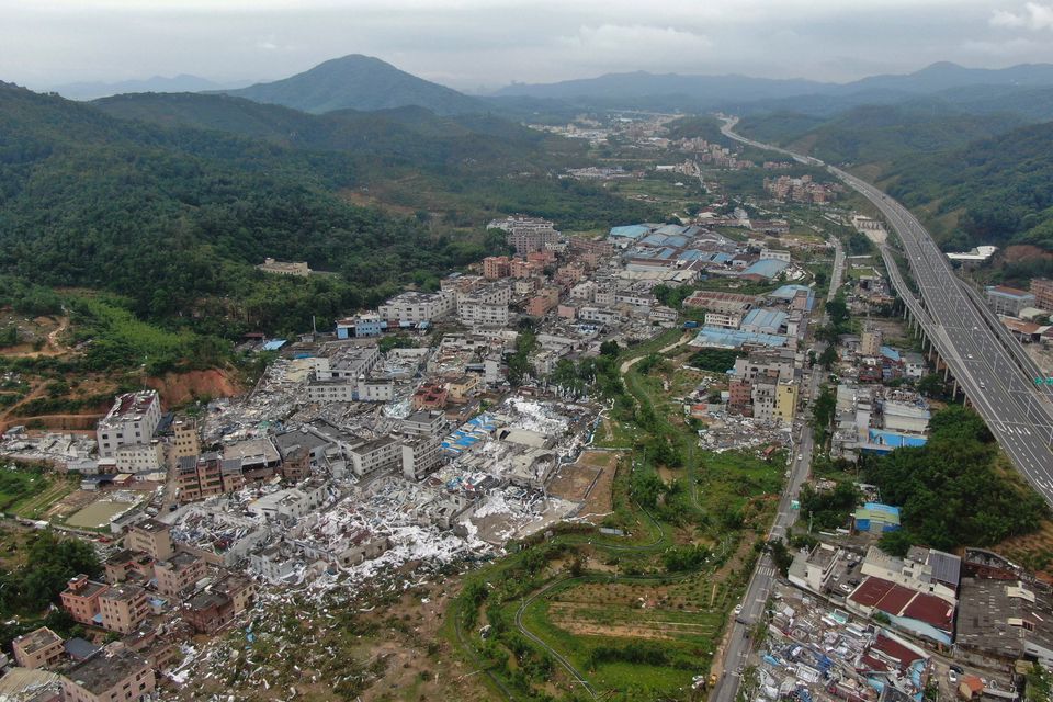 An aerial view shows damaged buildings in the aftermath of a tornado in Guangming village in south China's Guangdong Province. Photo: AP