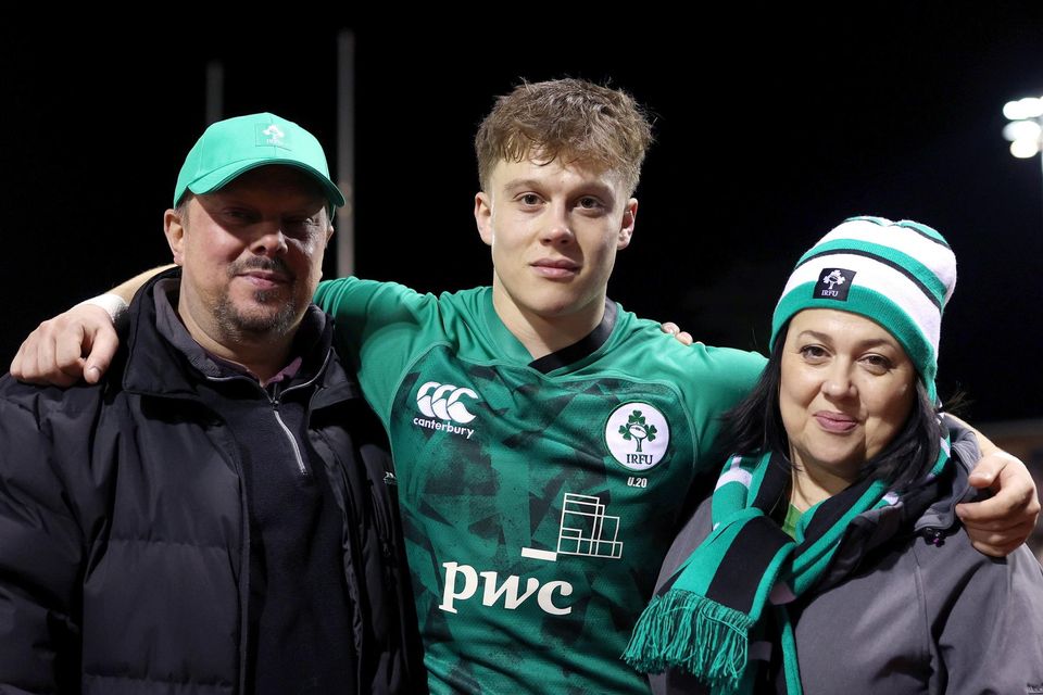 Hollywood's Oscar Cawley with his parents after the U20 Six Nations Rugby Championship match between Wales and Ireland at Stadiwm CSM in Colwyn Bay, Wales.